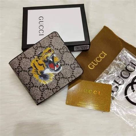 portafoglio gucci tigre|Gucci tiger jewelry.